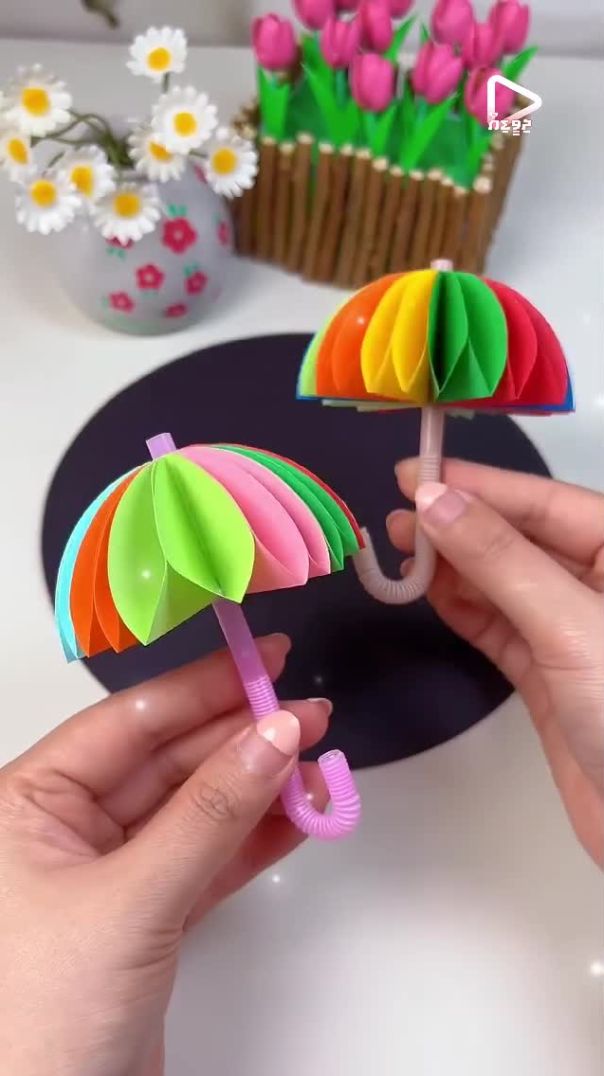 Make a beautiful rainbow umbrella using origami and straws